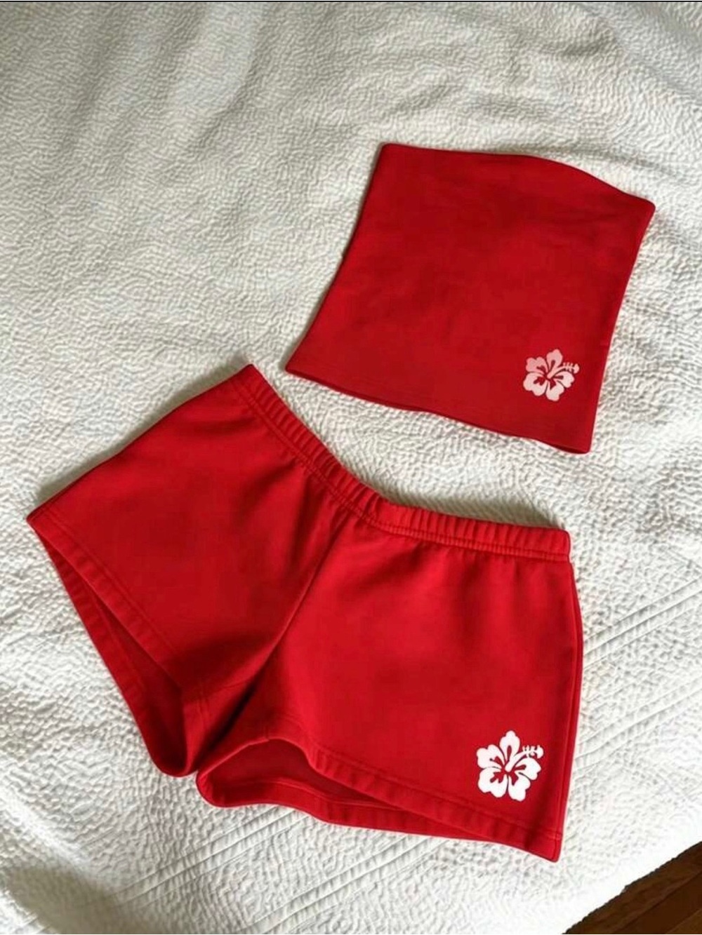 SHEIN Red Athletic Shorts with White Hibiscus Accent